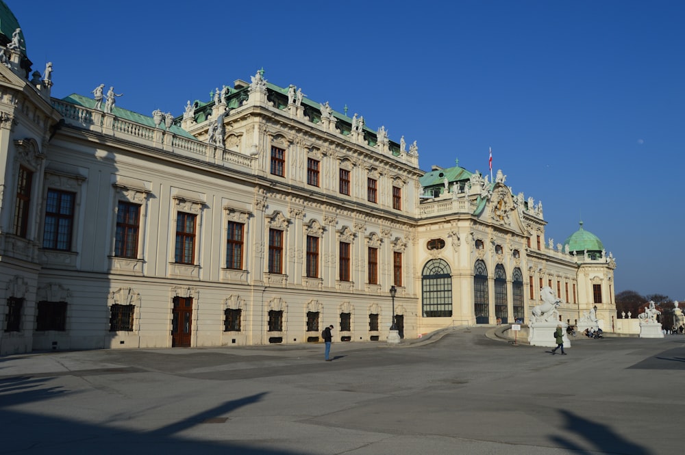 a large building with a green dome on top of it