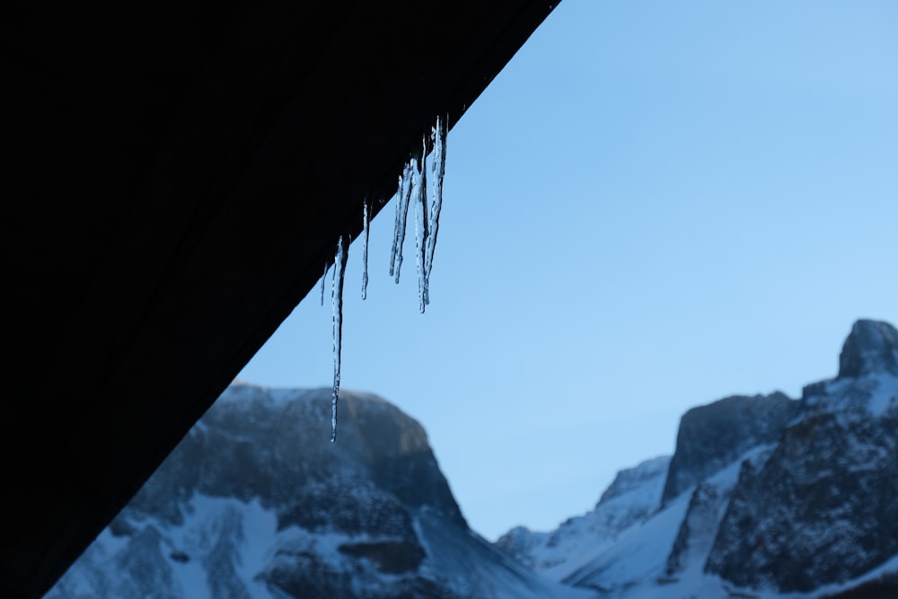 icicles hanging from the roof of a building