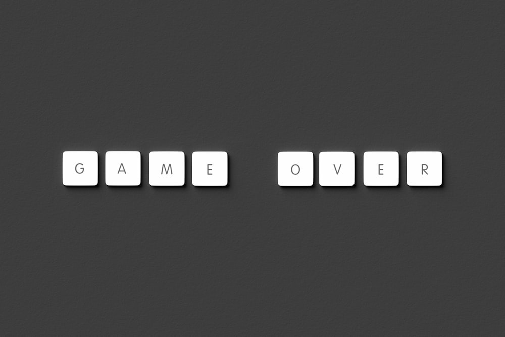 a black and white photo of the word game over