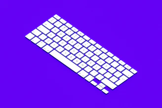 A clean, minimalistic keyboard with fingers poised to type on a bright, distraction-free background.