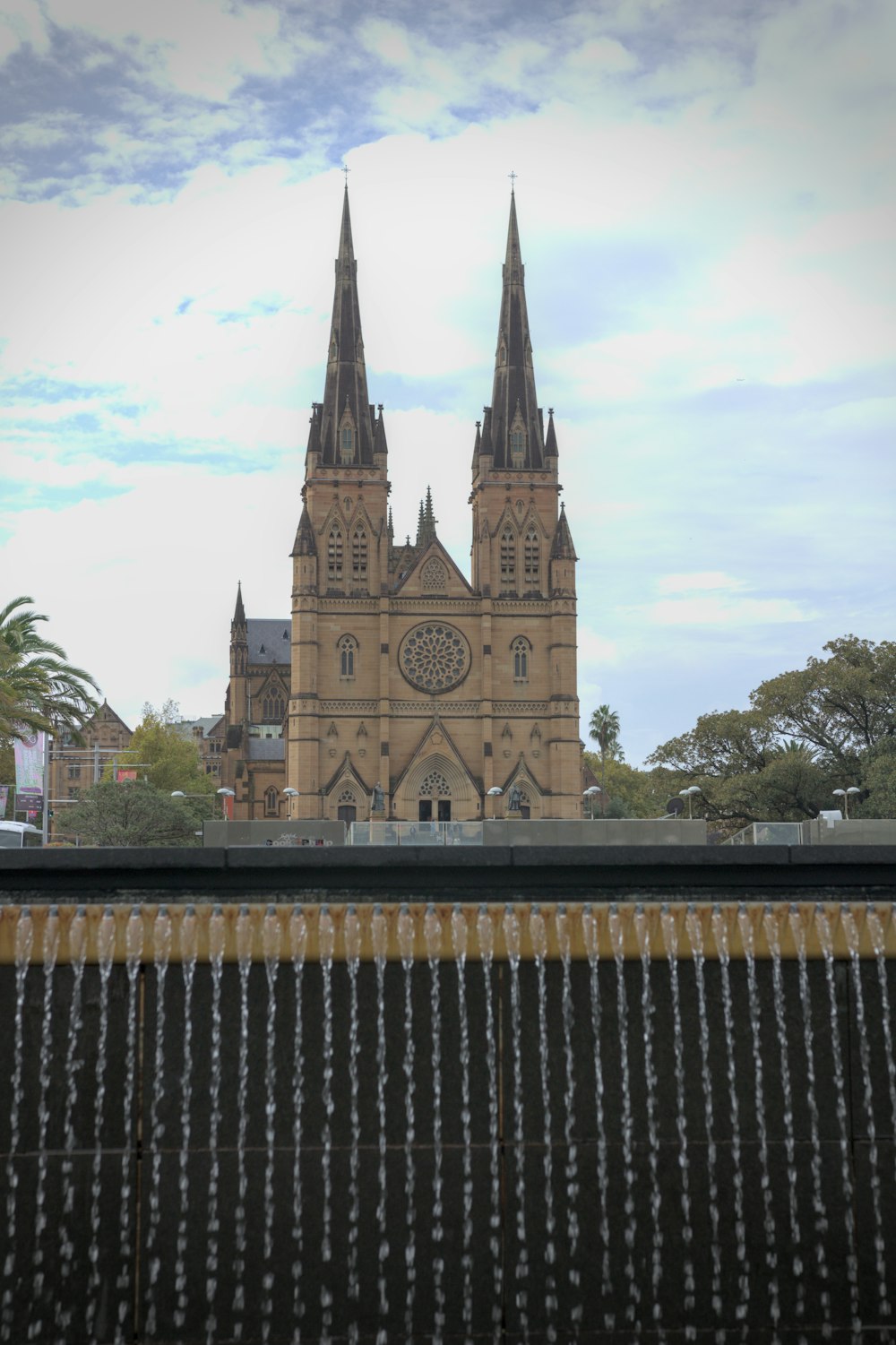 a large cathedral with a clock on it's side