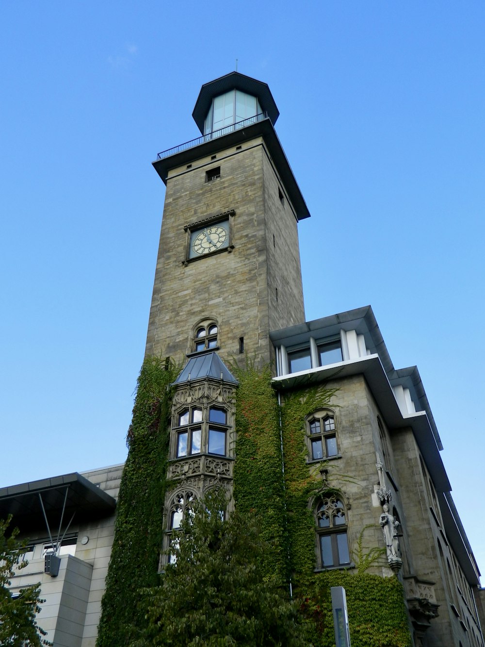 a tall building with a clock on the top of it