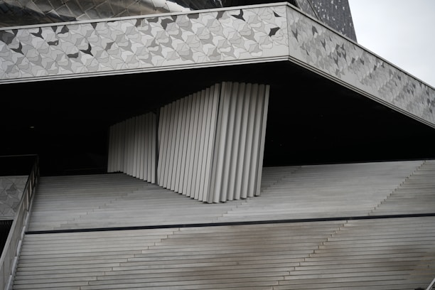 An abstract architectural detail in soft stone hues reflecting calm and stability.