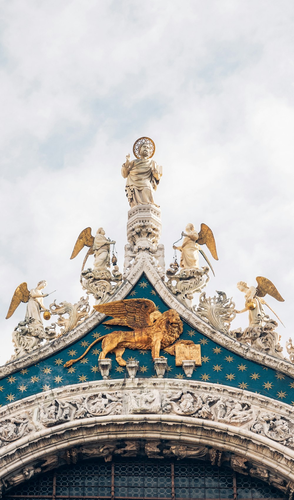 a building with a statue on top of it