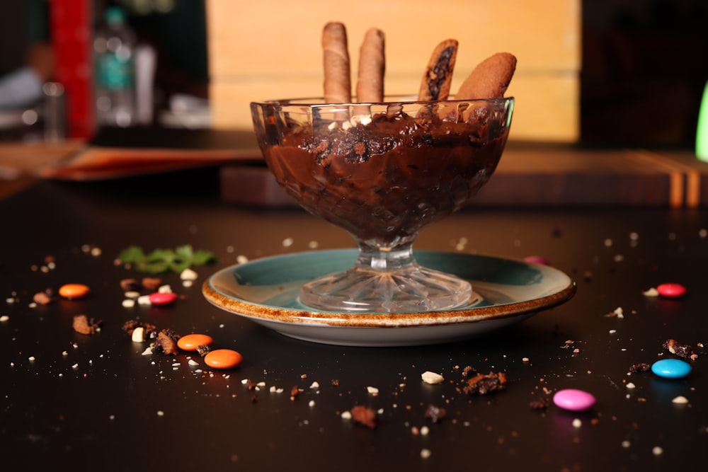 a chocolate dessert in a glass on a table
