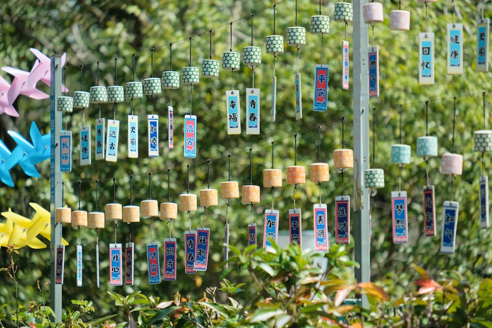 a display of toothpaste and toothbrushes hanging from poles