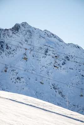 Ski lift climbing a snowy mountainside in Les Arcs
