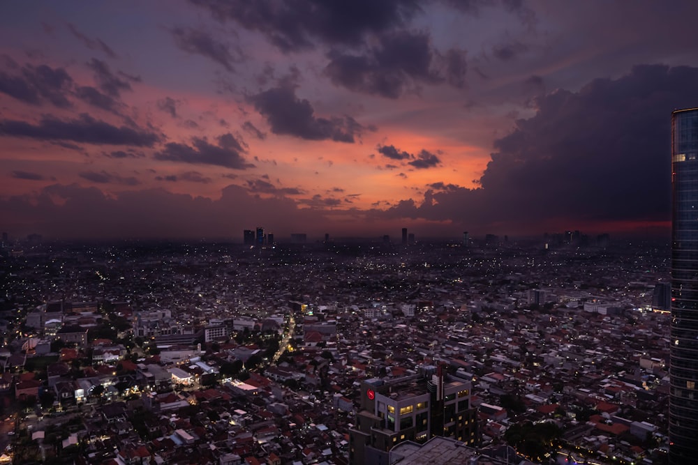 a view of a city at night from a tall building