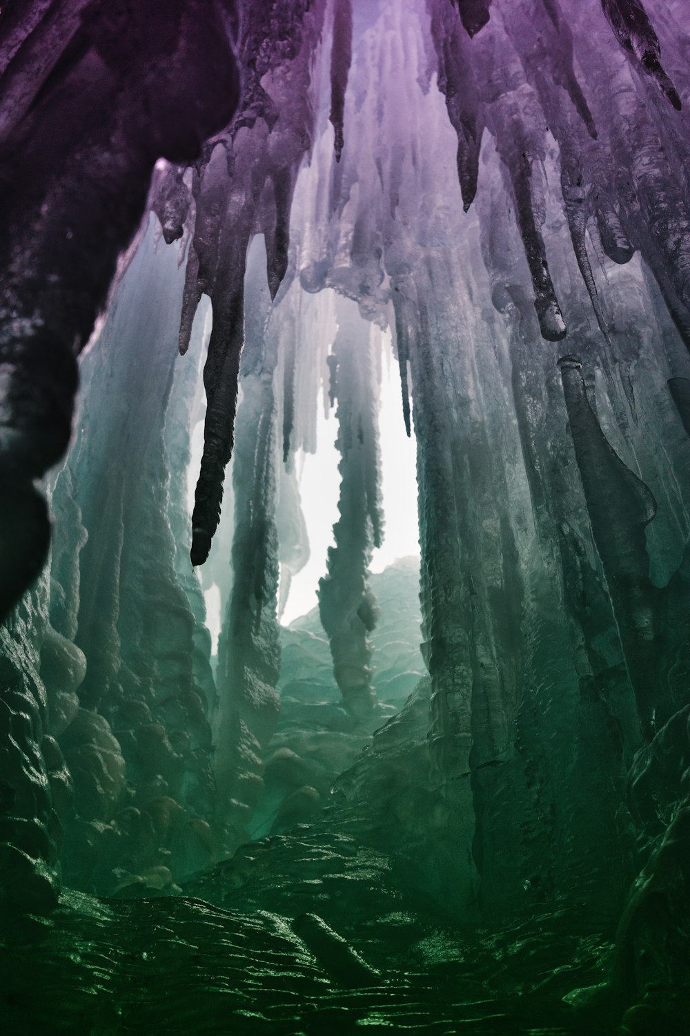 a cave filled with lots of ice and water