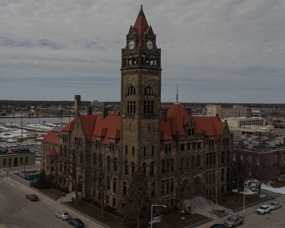 a large building with a clock on the top of it