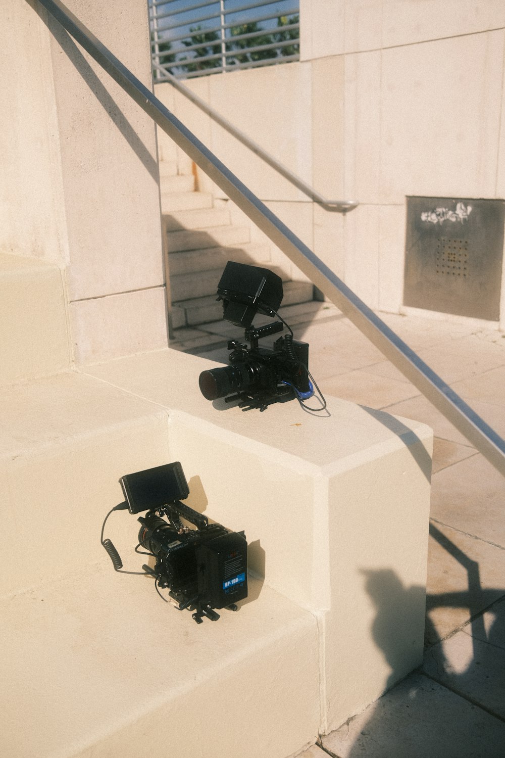 a camera set up on the steps of a building