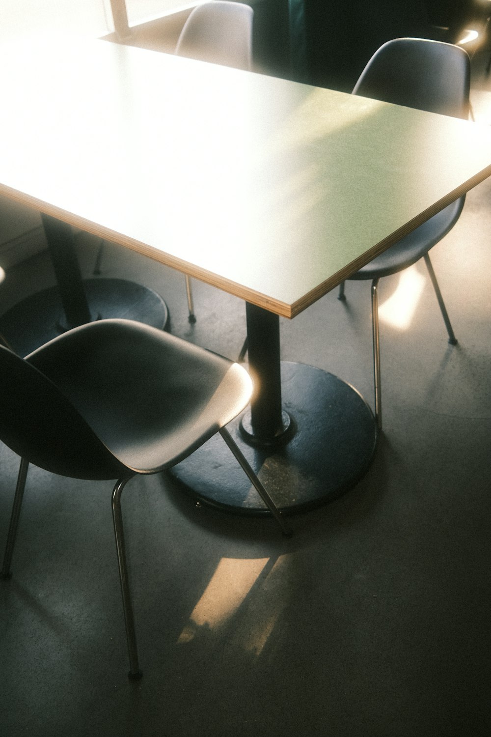 a table and chairs in a room