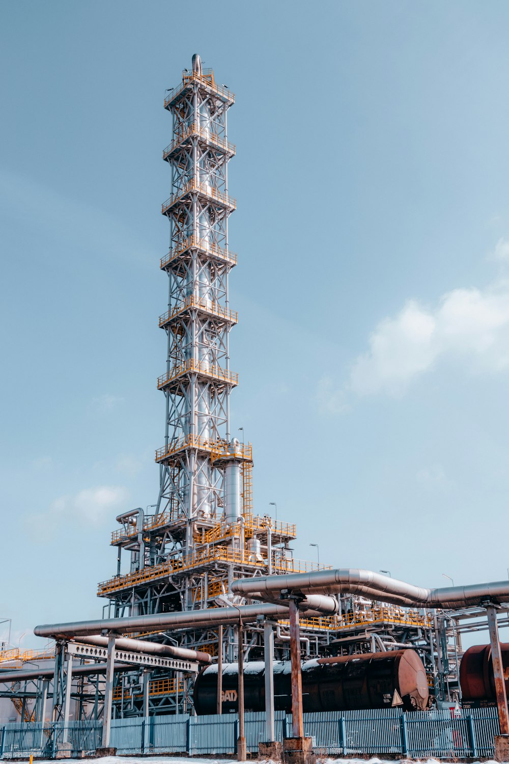 a very tall tower with a lot of pipes