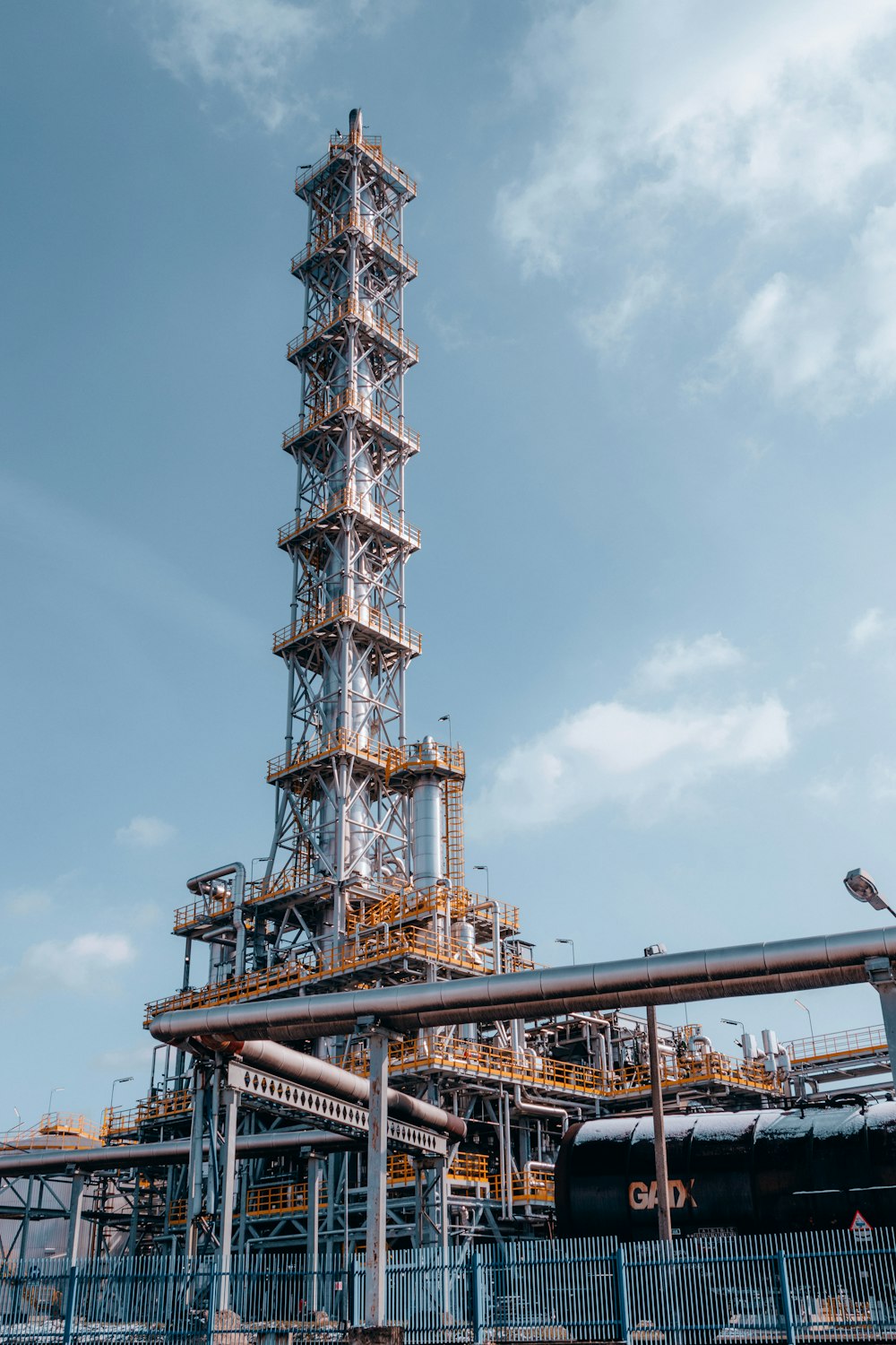 a very tall tower with a lot of pipes