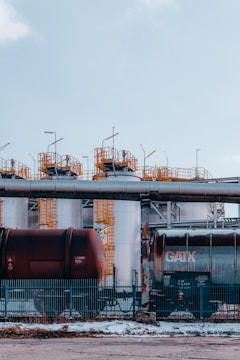 a train on a train track near a building