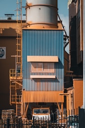 a truck is parked in front of a building