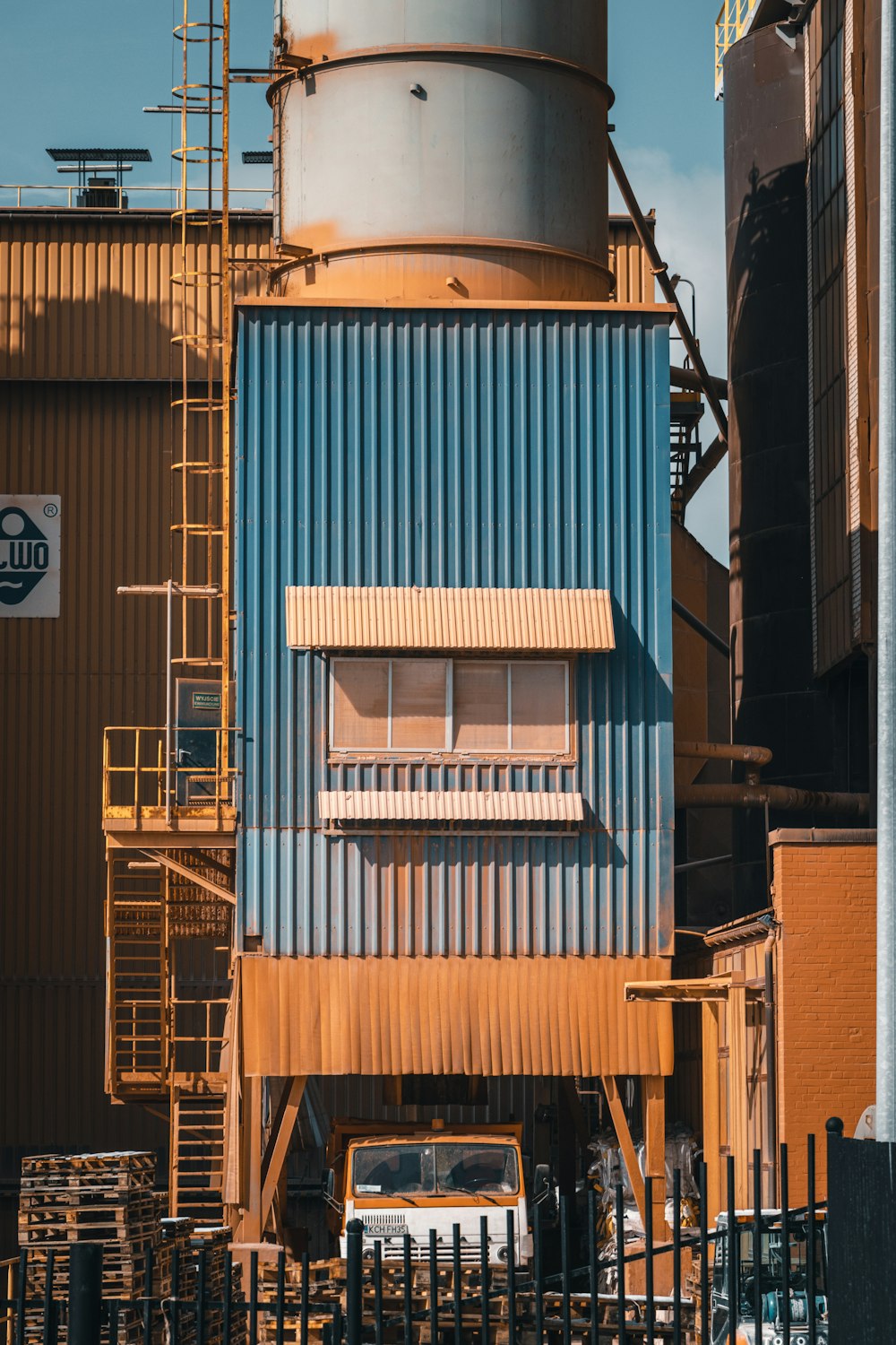 a truck is parked in front of a building