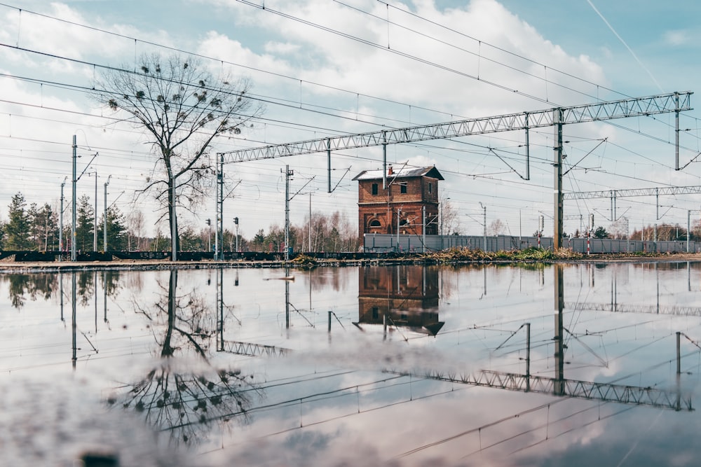 a building sitting in the middle of a flooded area