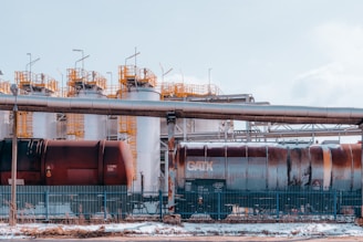 a train on a train track next to a building