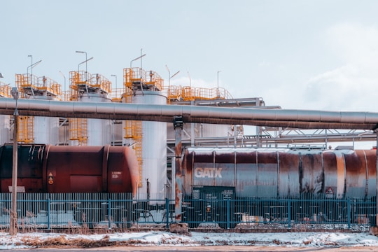 a train on a train track next to a building