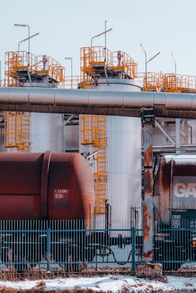 a train on a train track next to a building
