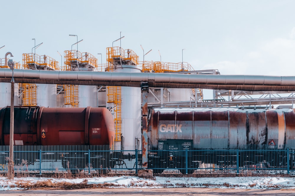 a train on a train track next to a building