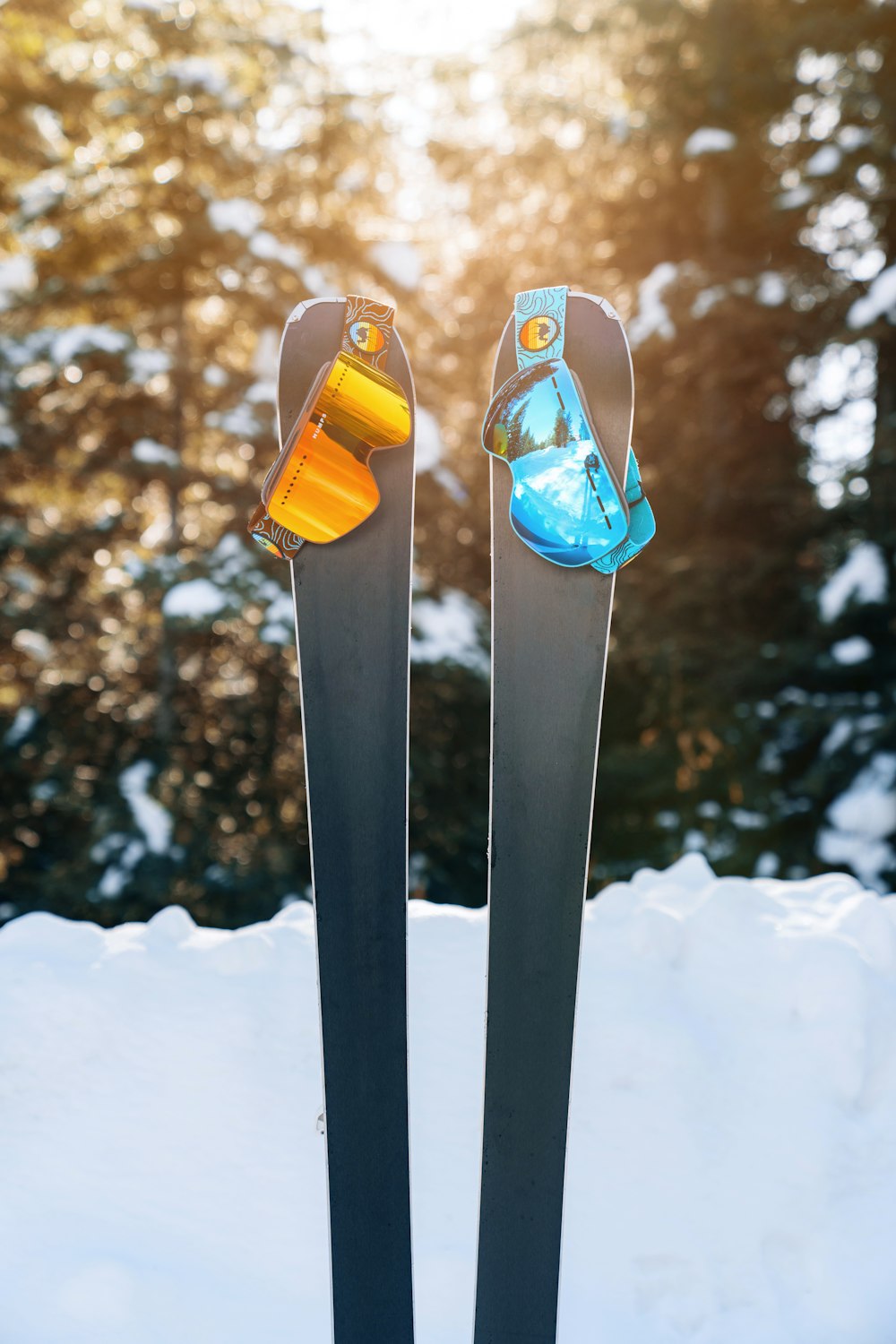 a pair of skis sticking out of the snow