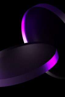 a black and purple background with two circles