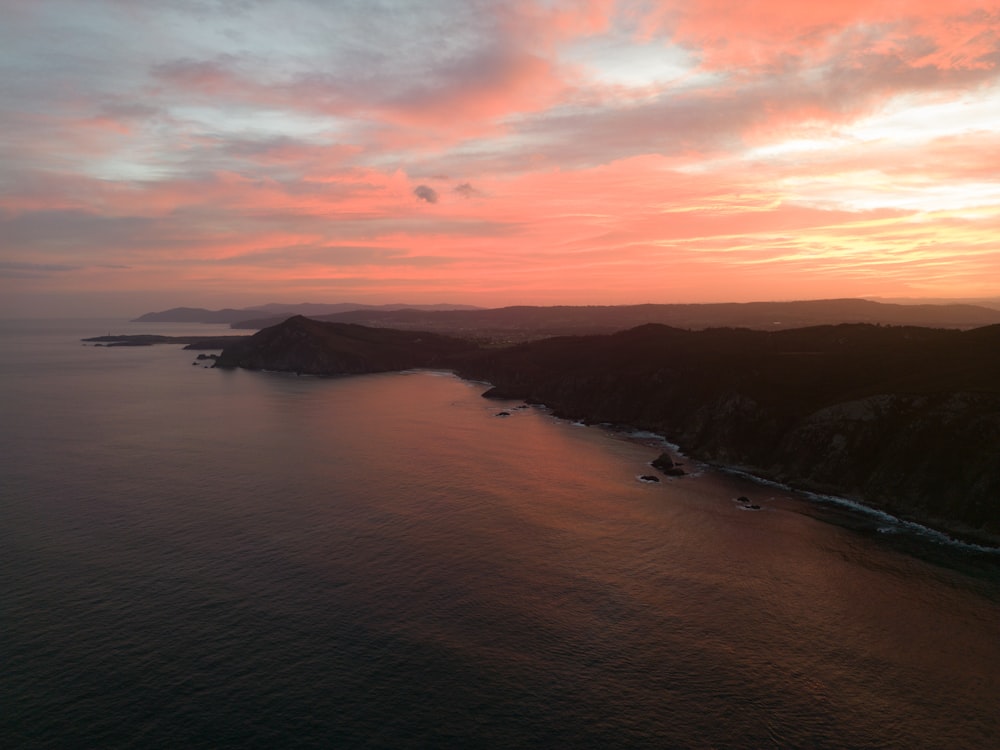 a beautiful sunset over a large body of water