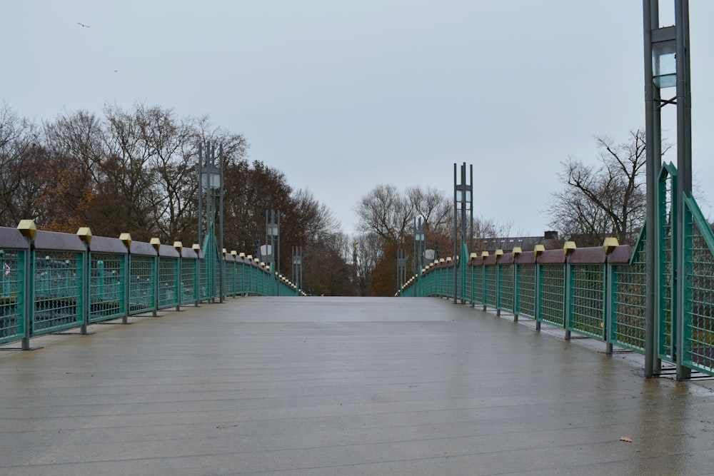 a bridge that has a bunch of benches on it