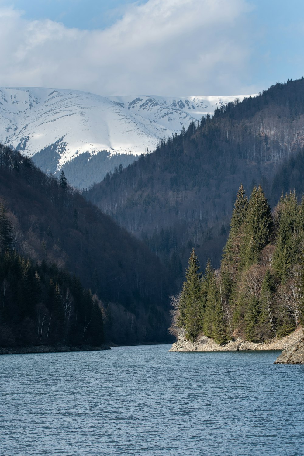 a large body of water surrounded by mountains