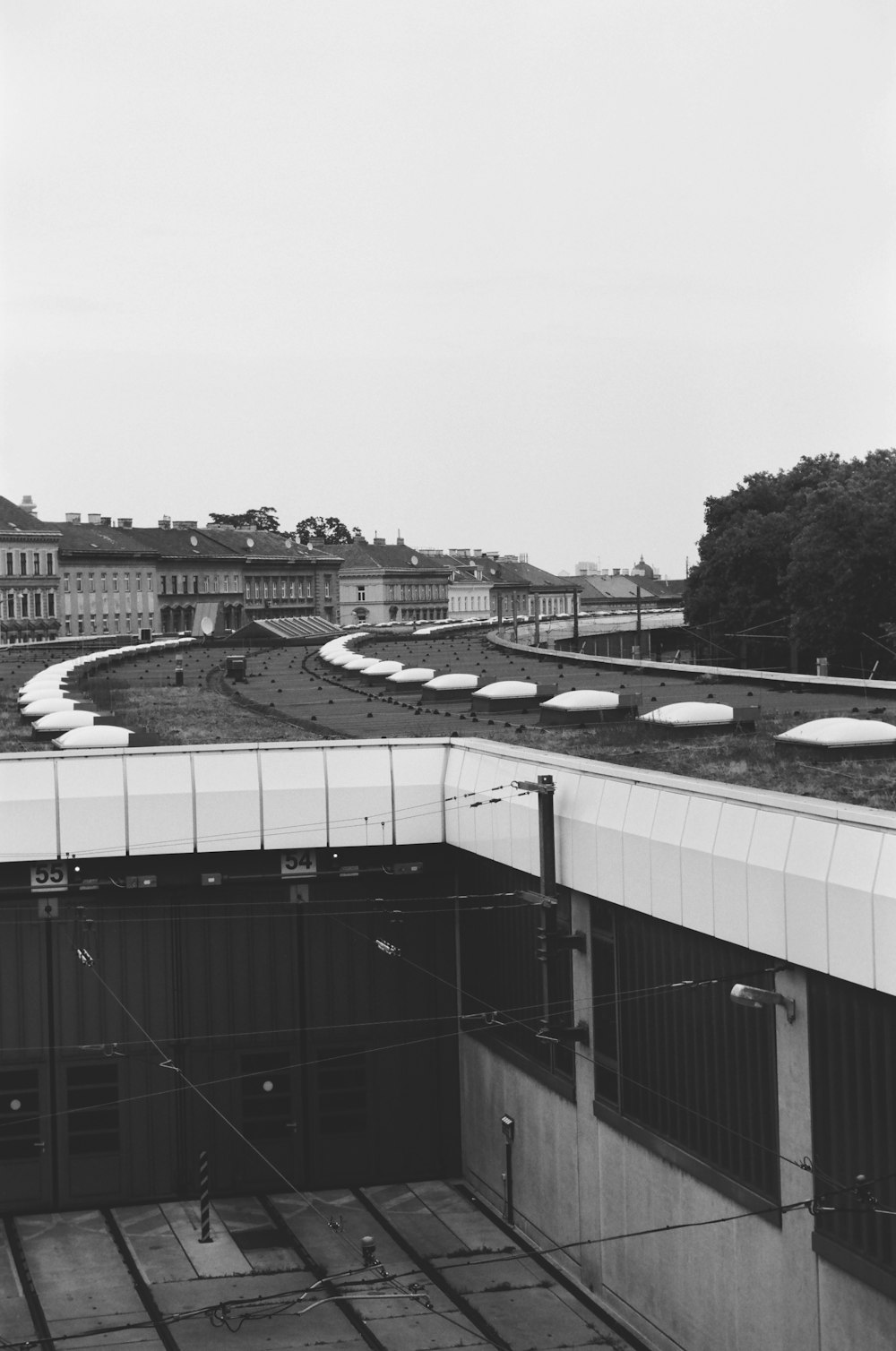 a black and white photo of a train track