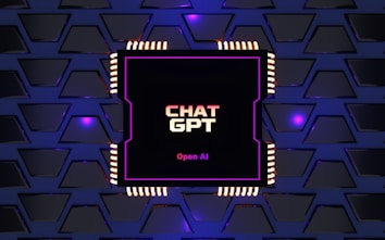 A digital rendering of an electronic circuit board, with a central black chip featuring the text 'CHAT GPT' and 'Open AI' in gradient colors. The background consists of a pattern of interconnected triangular plates, illuminated with a blue and purple glow, adding a futuristic feel.