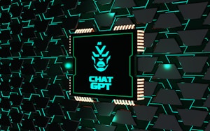 A stylized representation of a computer chip is integrated into a black and teal geometric background. The chip features a minimalist, futuristic face design along with the text 'CHAT GPT' in bold, glowing teal. The background consists of repeating black shapes outlined in teal, creating a high-tech, digital atmosphere.