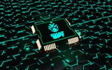 a computer chip that is glowing green in the dark