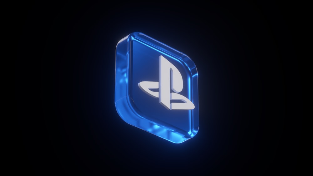 the playstation logo is glowing in the dark