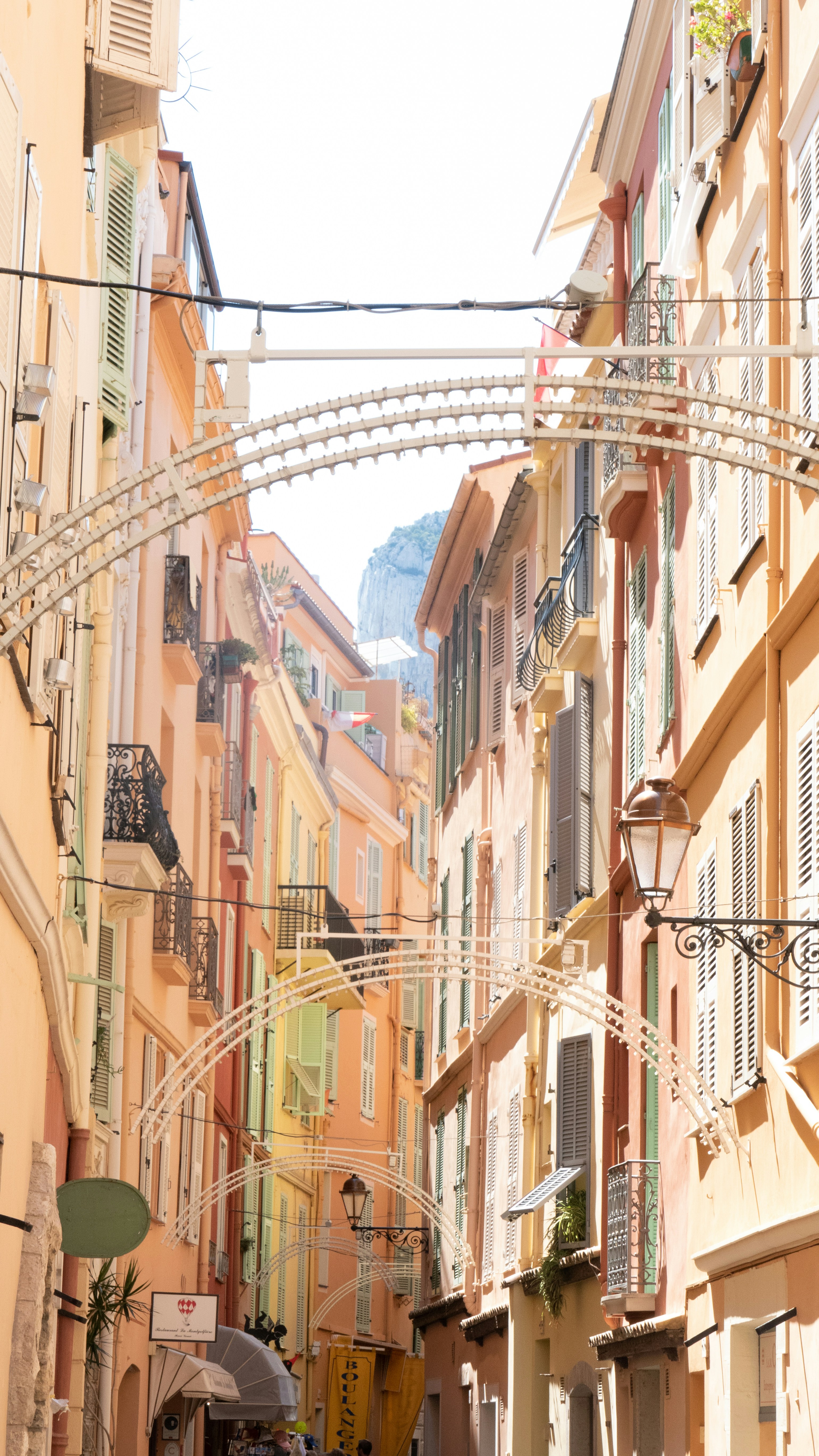 a city street lined with tall buildings and lots of traffic