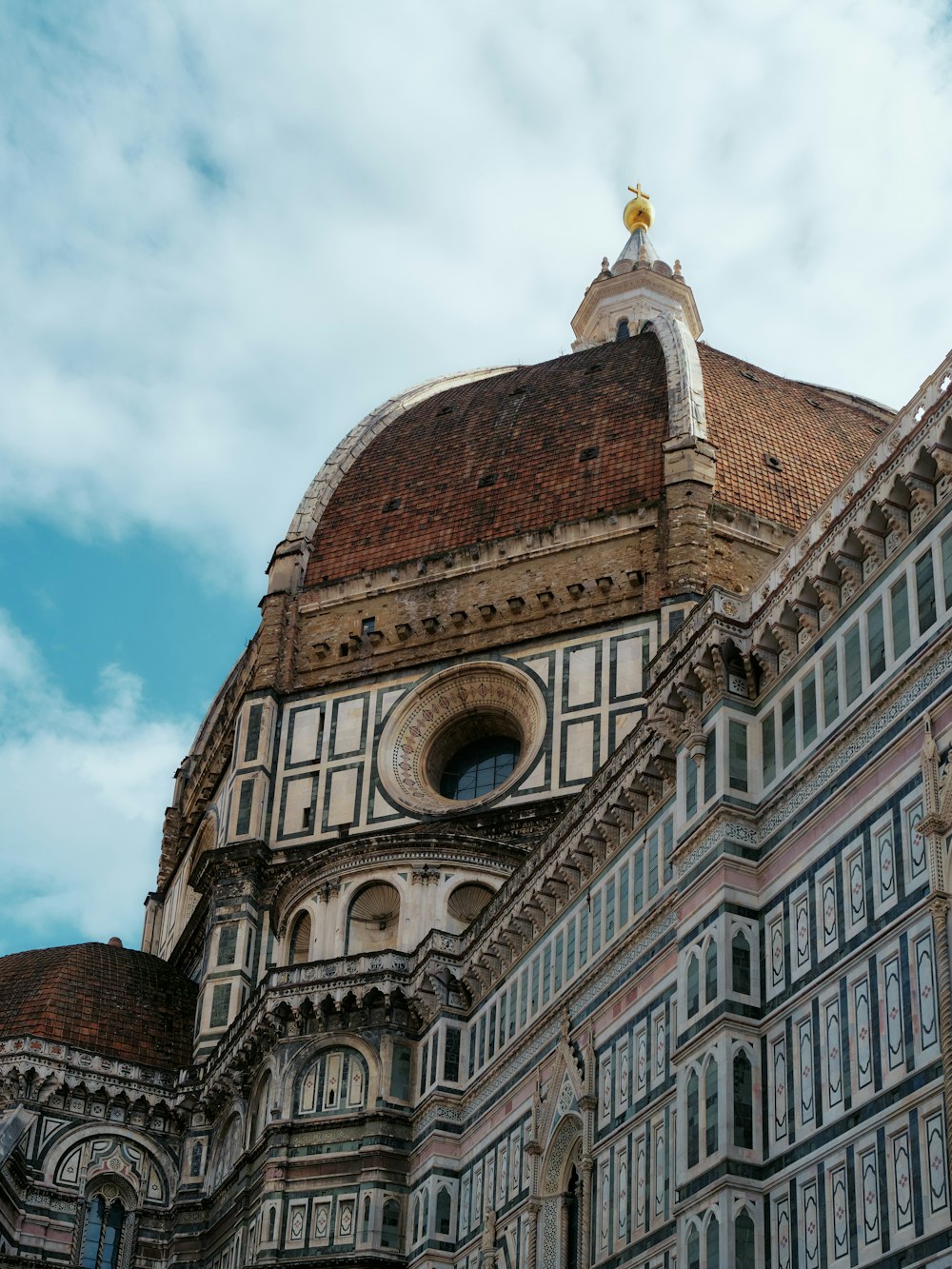 a large building with a clock on the top of it