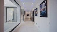Durable and stylish PVC flooring in a residential hallway, complementing the matching wall decor.