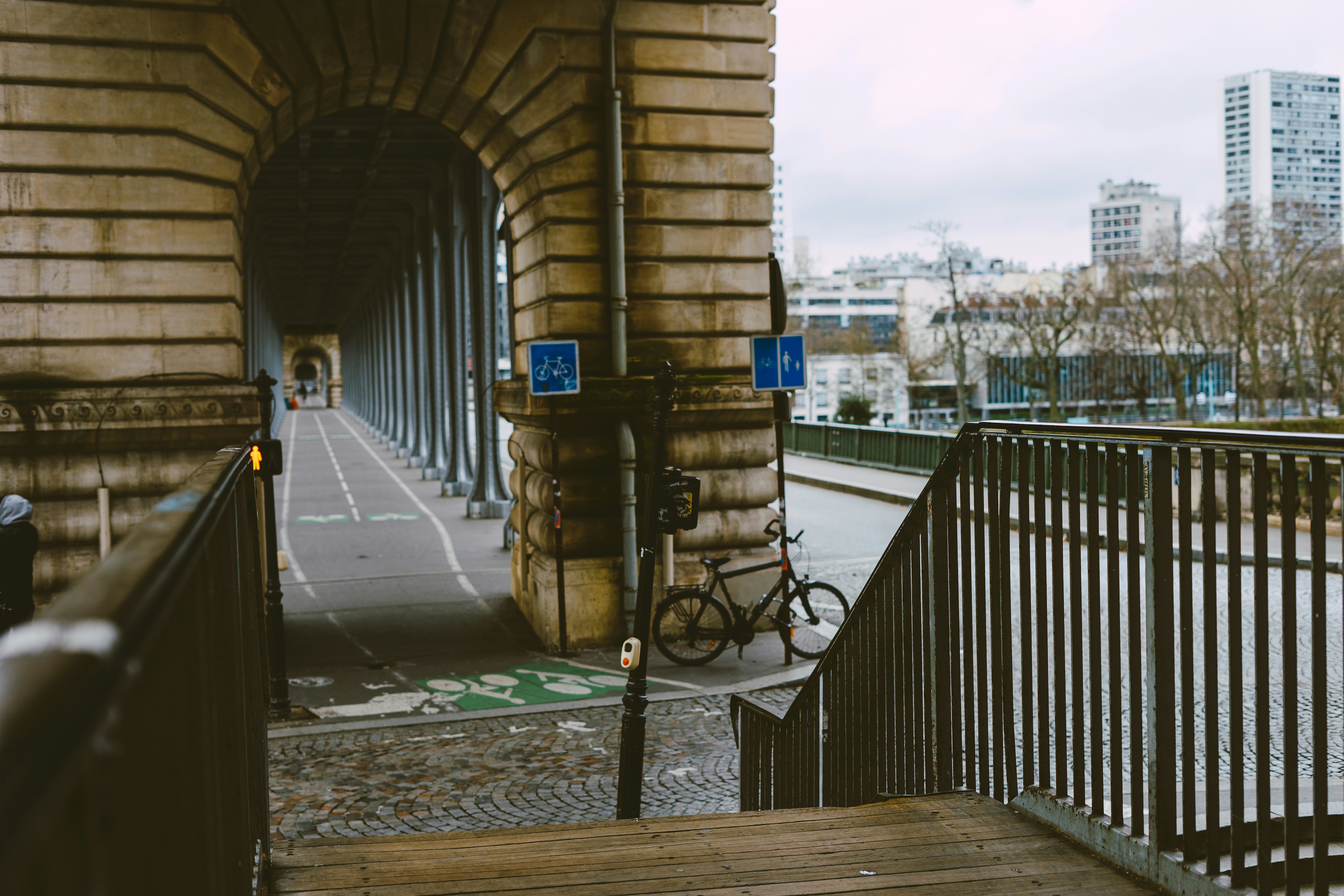 a bicycle parked on the side of a building