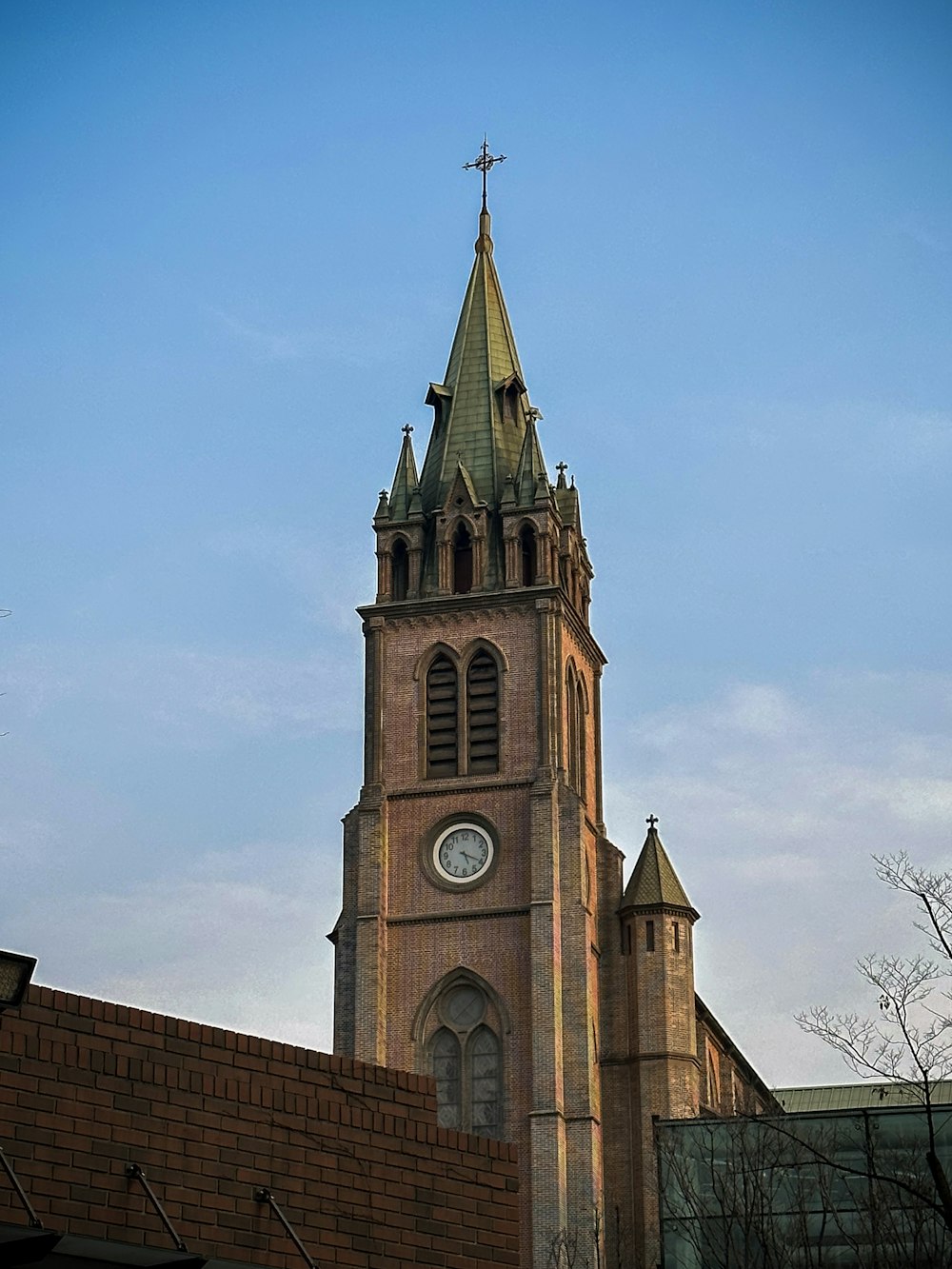 a tall tower with a clock on the top of it