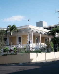 A charming single-family home with a lush garden in a quiet South Florida neighborhood.