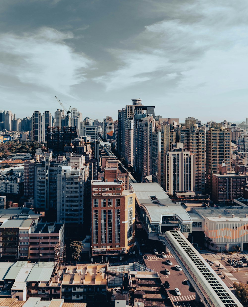 a view of a city with tall buildings