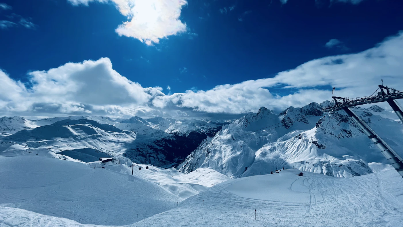 Snowy slopes and ski lift above St. Anton am Arlberg, Austria