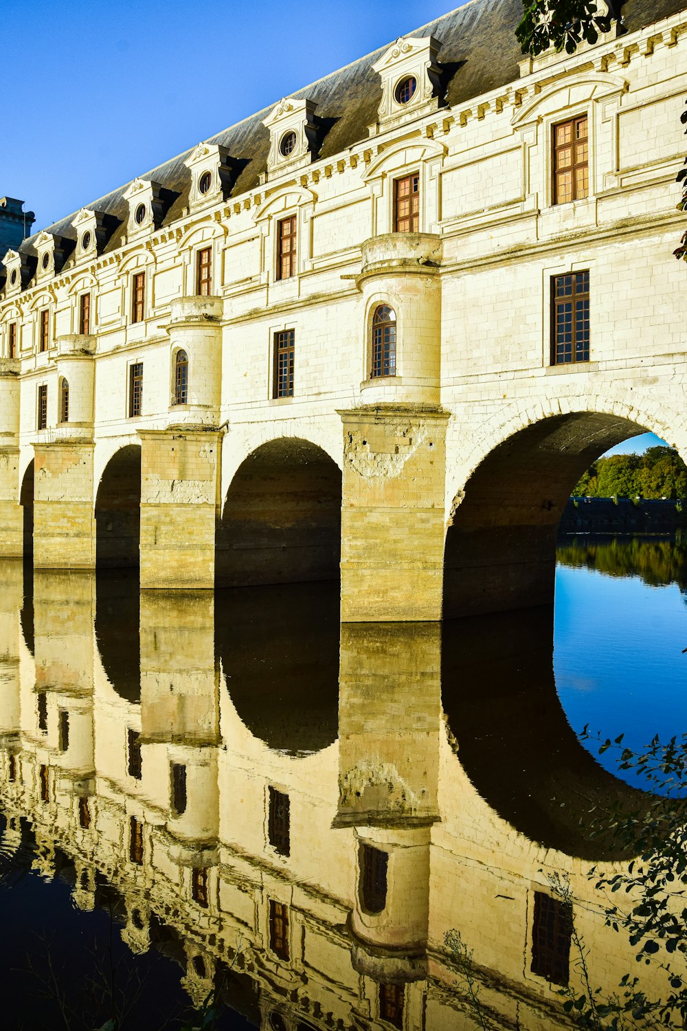 a large stone bridge over a body of water