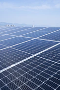 a large solar panel with a sky background