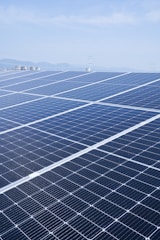 a large solar panel with a sky background