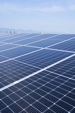 a large solar panel with a sky background