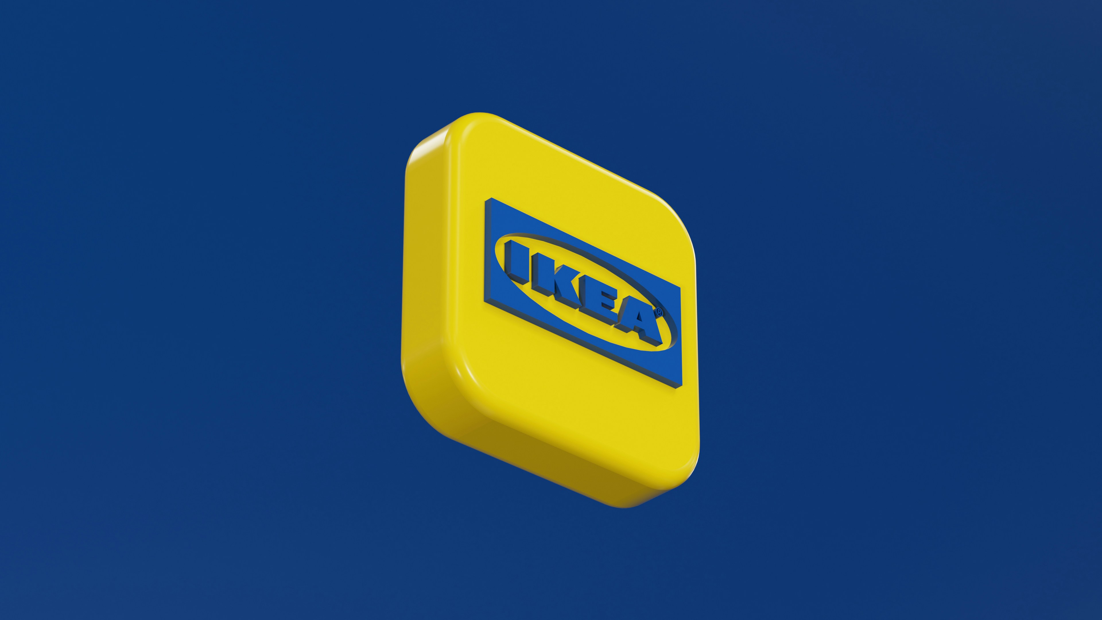 a yellow and blue logo on a blue sky