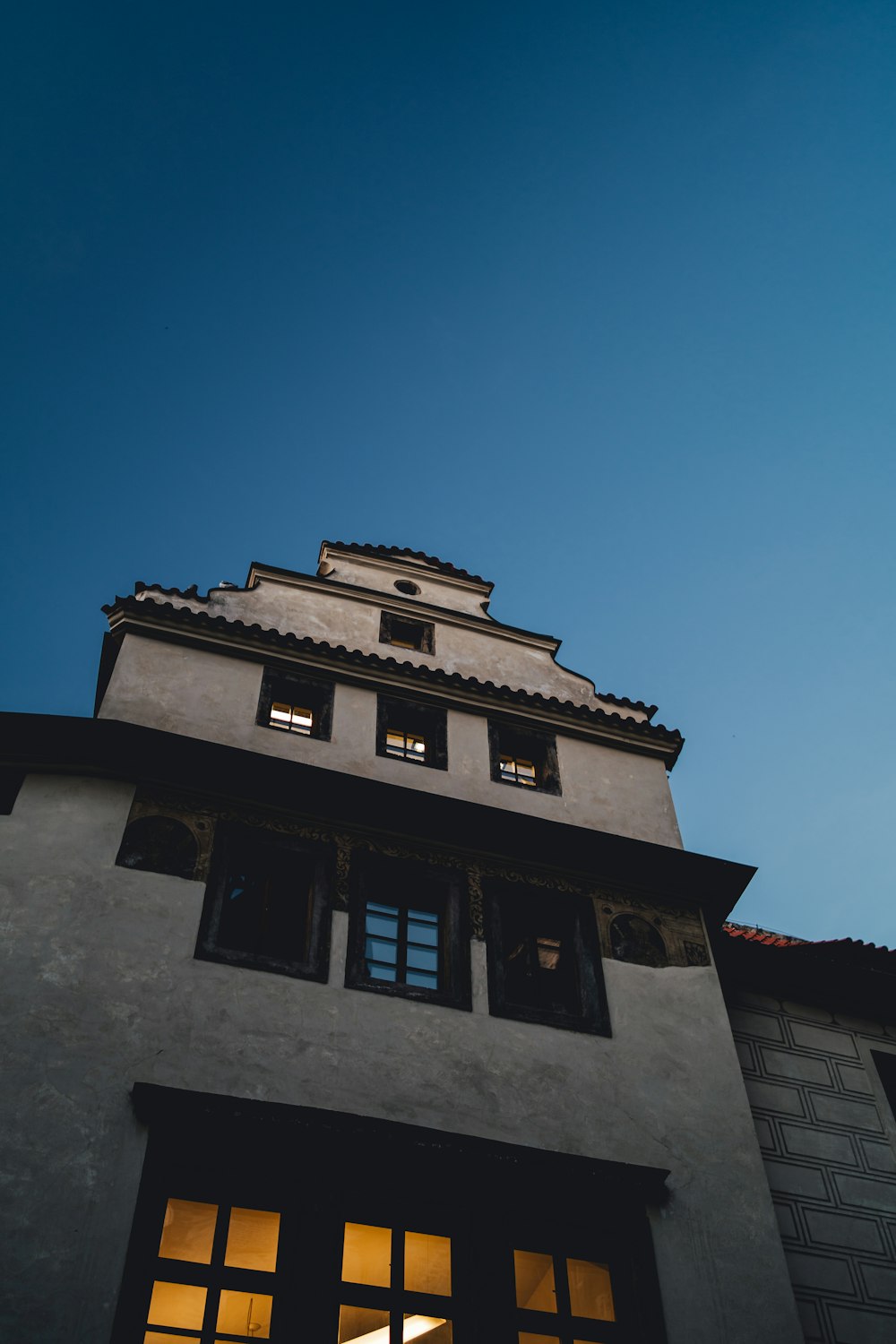 a tall building with a clock on the top of it